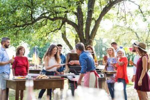 Family celebration or a barbecue party outside in the backyard.